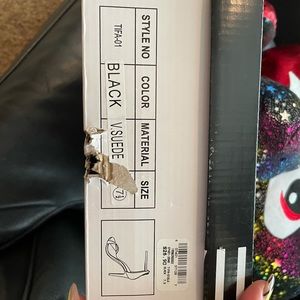 Black high heel shoe. Size is 7.5